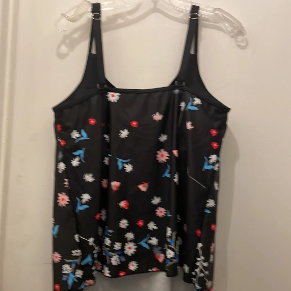 - New Woman’s swim tank black and floral size L adjustable